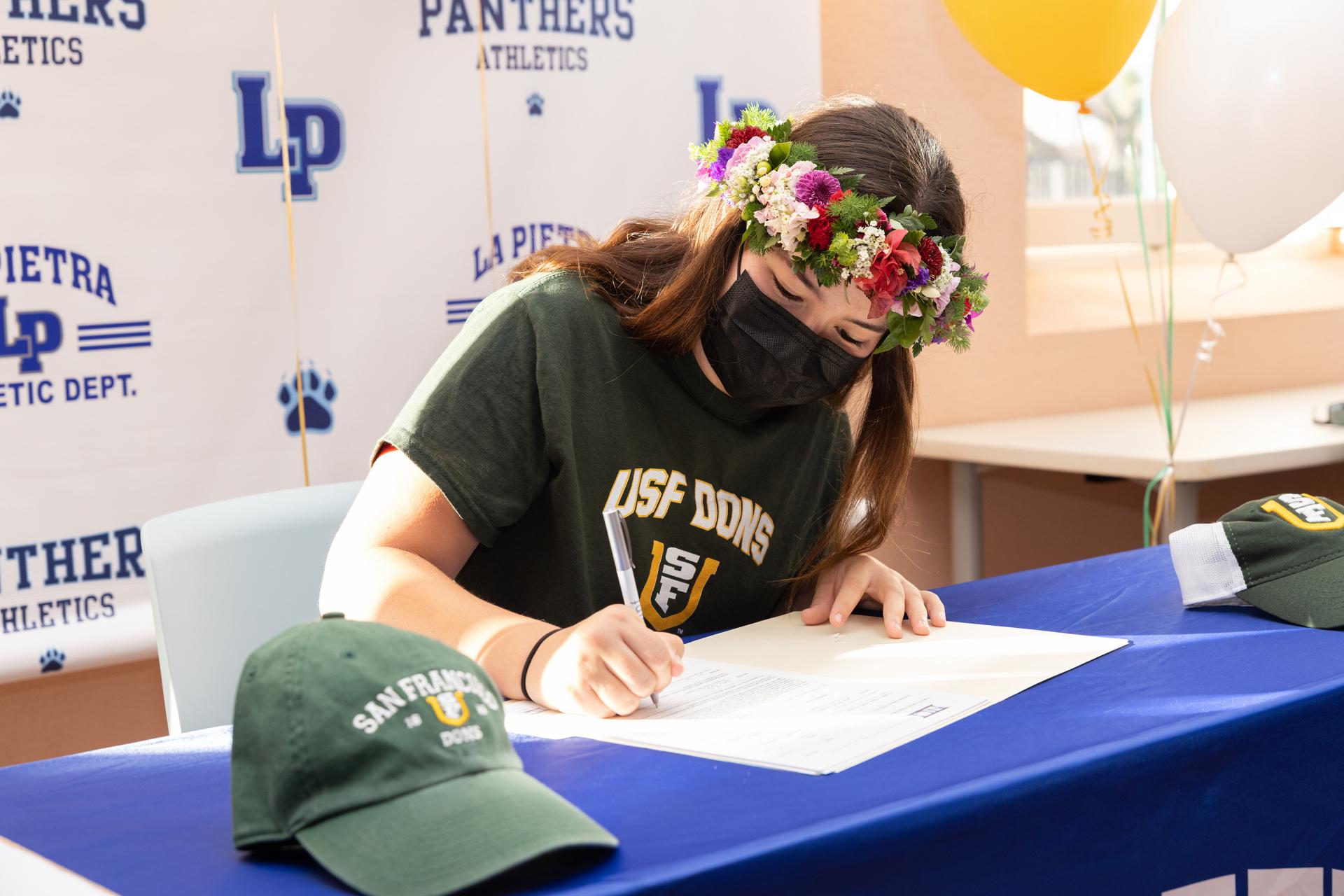 Chee signs her National Letter of Intent