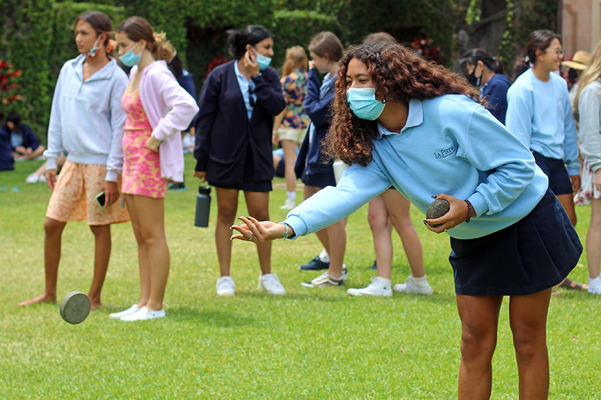 Senior Mayara S. tries her hand at ulu maika.