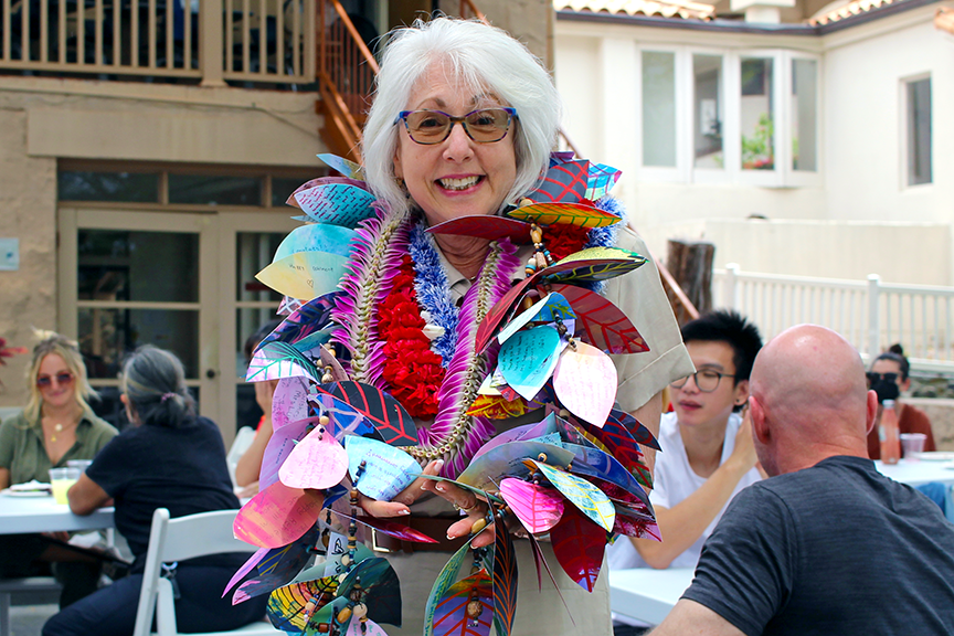 Shari sports her lei made up of farewell messages from students. 