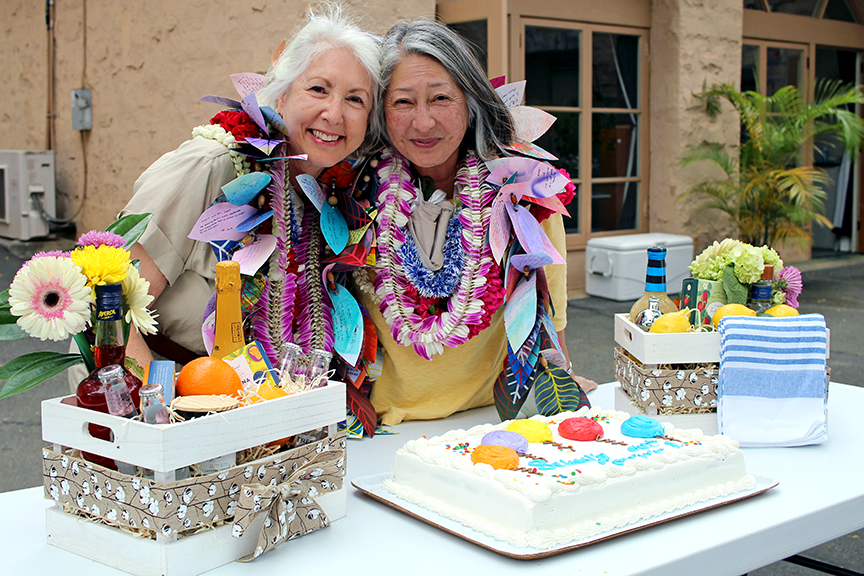 Shari and Gay get ready to cut into their retirement cake. "School's out forever!"