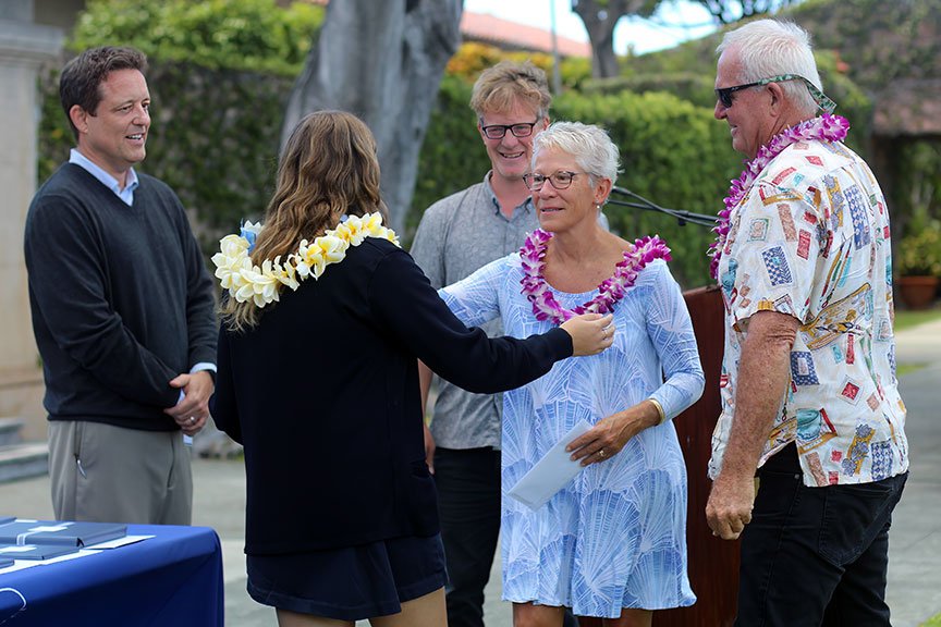 Abby M. celebrates with the Howe family after receiving The Nicole Howe Award