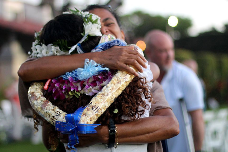 Mayara S. and her mom celebrate with a long embrace.