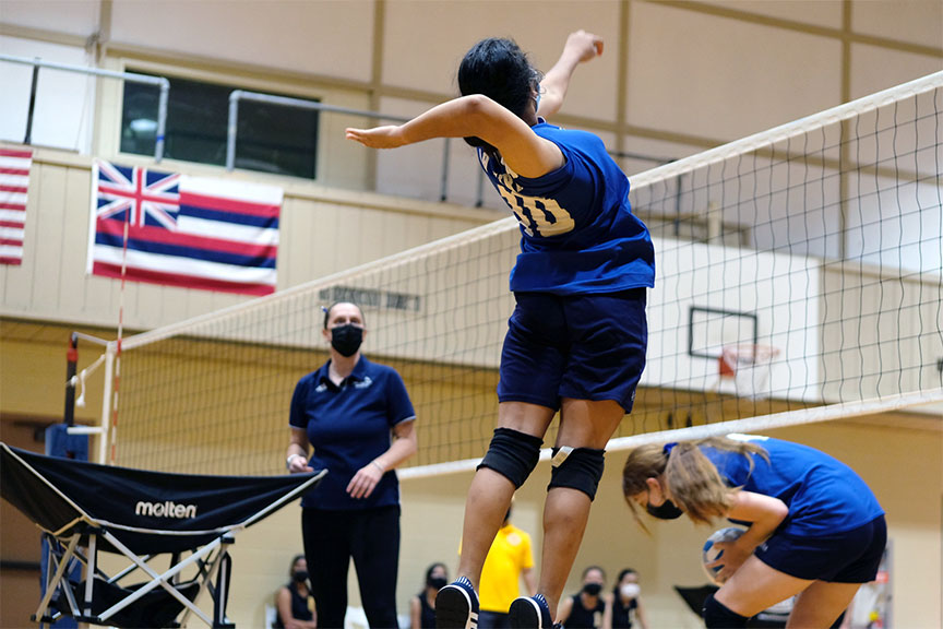 La Pietra varsity volleyball player gets ready to hit a pass.